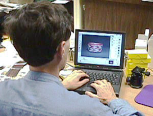 Dr. Hellmuth working on powebook