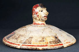 clay lid (figurine)