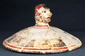 clay lid (figurine)
